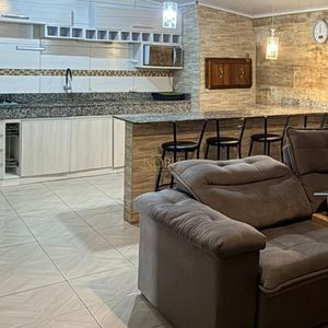 Casa com 130m², 2 dormitórios, 2 vagas no bairro Praia da Cal em Torres para Comprar