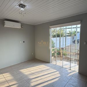 Casa com 100m², 2 dormitórios, 1 suíte no bairro Vila São João em Torres para Comprar
