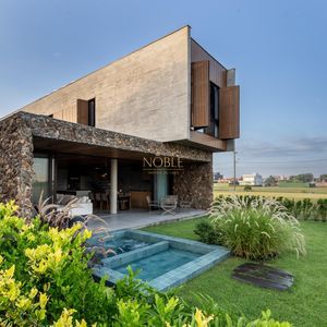 Casa de Condomínio com 244m², 4 dormitórios, 4 suítes, 2 vagas no Condomínio Ilhas Park em Torres para Comprar