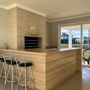 Casa de Condomínio com 320m², 4 dormitórios, 4 suítes, 4 vagas no Ocean Side em Torres para Comprar