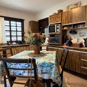 Casa com 240m², 4 dormitórios, 1 suíte, 3 vagas no bairro Praia da Cal em Torres para Comprar