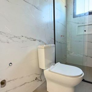 Casa com 146m², 3 dormitórios, 1 suíte, 2 vagas no Loteamento Jardim América em Passo de Torres para Comprar