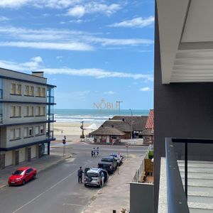 Apartamento com 108m², 3 dormitórios, 1 suíte, 2 vagas no Residencial DI Capri em Torres para Comprar