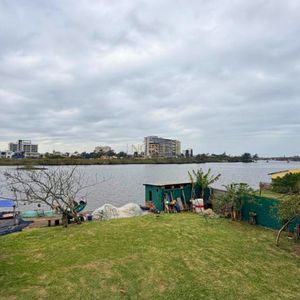 Casa com 300m², 4 dormitórios, 1 suíte no bairro Getúlio Vargas em Torres para Comprar
