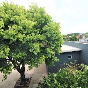 Sobrado com 220m², 5 dormitórios, 4 suítes, 3 vagas no bairro Stan em Torres para Comprar