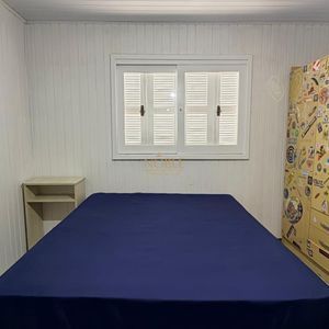 Casa com 130m², 2 dormitórios, 2 vagas no bairro Praia da Cal em Torres para Comprar