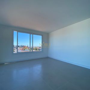 Apartamento com 88m², 2 dormitórios, 1 suíte, 2 vagas no Residencial Acrópole em Torres para Comprar
