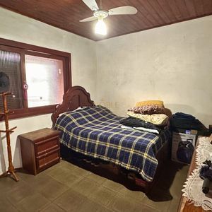 Casa, 3 dormitórios, 2 vagas no bairro Centro em Torres para Comprar