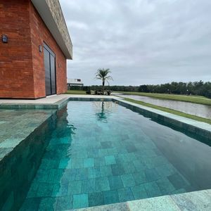 Casa de Condomínio com 220m², 3 dormitórios, 3 suítes, 2 vagas no Reserva das Águas em Torres para Comprar