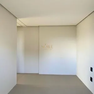 Apartamento com 72m², 2 dormitórios, 1 suíte, 1 vaga no Majestic Residencial em Torres para Comprar