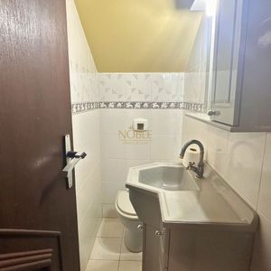 Casa com 420m², 5 dormitórios, 3 suítes, 1 vaga no bairro Centro em Torres para Comprar