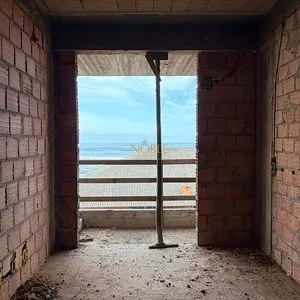 Apartamento com 85m², 2 dormitórios, 1 suíte, 1 vaga no Pescador em Passo de Torres para Comprar