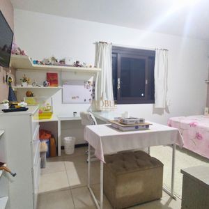 Casa, 6 dormitórios, 2 suítes, 3 vagas no bairro Getúlio Vargas em Torres para Comprar
