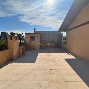 Casa, 6 dormitórios, 2 vagas no bairro Praia da Cal em Torres para Comprar