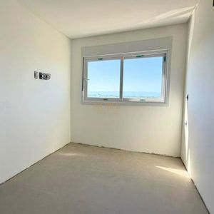 Apartamento com 121m², 3 dormitórios, 3 suítes, 1 vaga no Punta Del Sole em Torres para Comprar