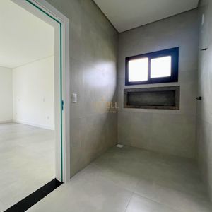 Casa com 288m², 4 dormitórios, 4 suítes, 4 vagas no bairro Bella Torres em Passo de Torres para Comprar