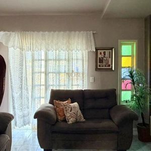 Casa com 171m², 4 dormitórios, 3 vagas no bairro Porto Alegre em Torres para Comprar