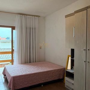 Casa com 130m², 4 dormitórios, 4 vagas no bairro Getúlio Vargas em Torres para Comprar