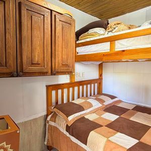 Casa com 240m², 4 dormitórios, 1 suíte, 3 vagas no bairro Praia da Cal em Torres para Comprar