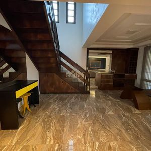 Sobrado com 260m², 4 dormitórios, 1 suíte, 2 vagas no bairro Igra Norte em Torres para Comprar