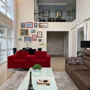 Casa com 600m², 4 dormitórios, 1 suíte, 4 vagas no bairro Igra Norte em Torres para Comprar