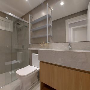 Apartamento com 108m², 3 dormitórios, 1 suíte, 2 vagas no Maui Residencial em Torres para Comprar