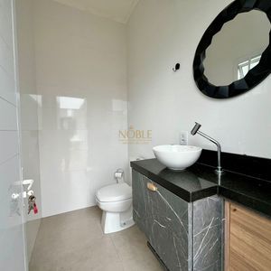 Casa com 670m², 5 dormitórios, 3 suítes, 3 vagas no bairro Bellatorres em Passo de Torres para Comprar