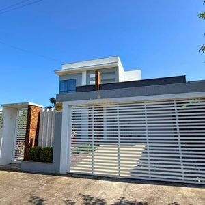 Casa com 210m², 3 dormitórios, 1 suíte, 2 vagas no bairro Novo Passo em Passo de Torres para Comprar