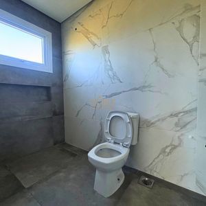 Casa de Condomínio com 220m², 3 dormitórios, 3 suítes, 2 vagas no Reserva das Águas em Torres para Comprar