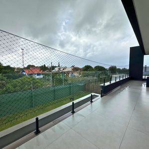 Casa de Condomínio com 435m², 4 dormitórios, 4 suítes, 4 vagas no Ocean Side em Torres para Comprar