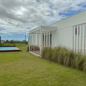 Casa de Condomínio com 174m², 3 dormitórios, 3 suítes, 2 vagas no Reserva das Águas em Torres para Comprar