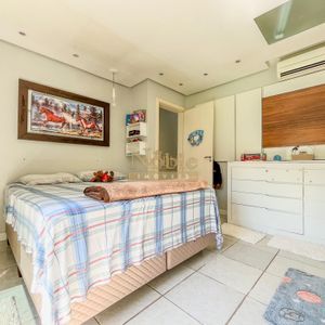 Casa, 2 dormitórios, 2 vagas no bairro Igra Norte em Torres para Comprar