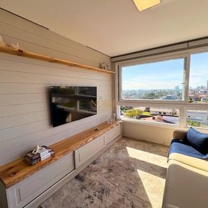 Apartamento com 72m², 2 dormitórios, 1 suíte, 1 vaga no Topazio em Torres para Comprar