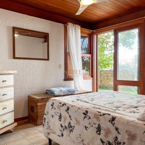 Casa, 4 dormitórios, 2 suítes, 3 vagas no bairro Praia Grande em Torres para Comprar