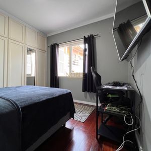 Casa com 184m², 3 dormitórios, 1 suíte, 2 vagas no bairro Igra Norte em Torres para Comprar