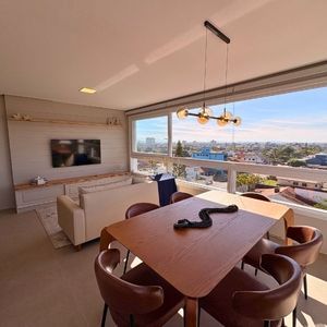 Apartamento com 72m², 2 dormitórios, 1 suíte, 1 vaga no Topazio em Torres para Comprar