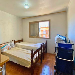 Apartamento com 82m², 2 dormitórios, 1 vaga no Edifício Dona Emília em Torres para Comprar