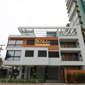 Apartamento com 128m², 3 dormitórios, 1 suíte, 2 vagas no Casa Carmel em Torres para Comprar