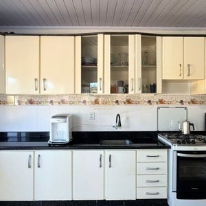 Casa com 125m², 4 dormitórios, 1 suíte, 2 vagas no bairro Vila São João em Torres para Comprar
