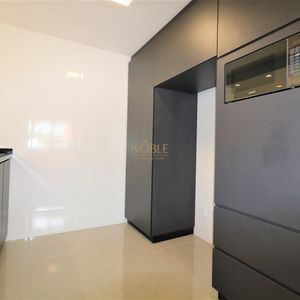 Sobrado com 220m², 5 dormitórios, 4 suítes, 3 vagas no bairro Stan em Torres para Comprar