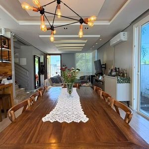 Casa com 210m², 3 dormitórios, 1 suíte, 2 vagas no bairro Novo Passo em Passo de Torres para Comprar