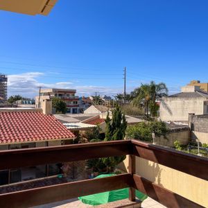 Casa com 300m², 3 dormitórios, 3 suítes, 4 vagas no bairro Centro em Torres para Comprar