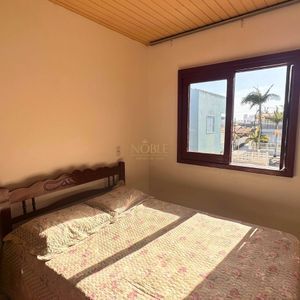 Casa, 6 dormitórios, 2 vagas no bairro Praia da Cal em Torres para Comprar