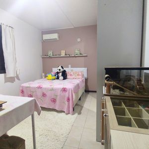 Casa, 6 dormitórios, 2 suítes, 3 vagas no bairro Getúlio Vargas em Torres para Comprar