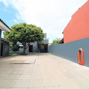 Sobrado com 220m², 5 dormitórios, 4 suítes, 3 vagas no bairro Stan em Torres para Comprar