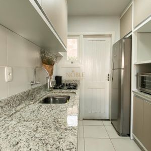 Sobrado com 54m², 2 dormitórios, 1 vaga no Residencial Bela Vista em Torres para Comprar