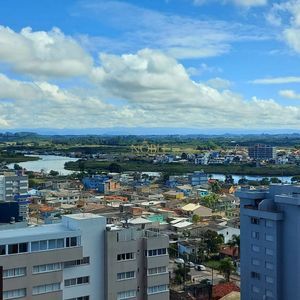 Apartamento com 77m², 2 dormitórios, 1 suíte, 1 vaga no Origem em Torres para Comprar