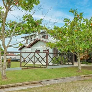 Casa, 4 dormitórios, 1 suíte, 2 vagas no bairro Itapeva Norte em Torres para Comprar