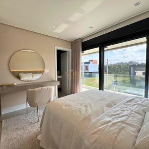 Casa de Condomínio com 311m², 3 dormitórios, 3 suítes, 2 vagas no Reserva das Águas em Torres para Comprar