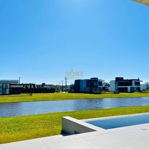 Casa de Condomínio com 390m², 4 dormitórios, 4 suítes, 2 vagas no Reserva das Águas em Torres para Comprar